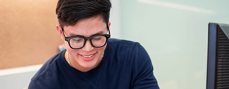 Young adult reviewing financial information related to credit score awareness